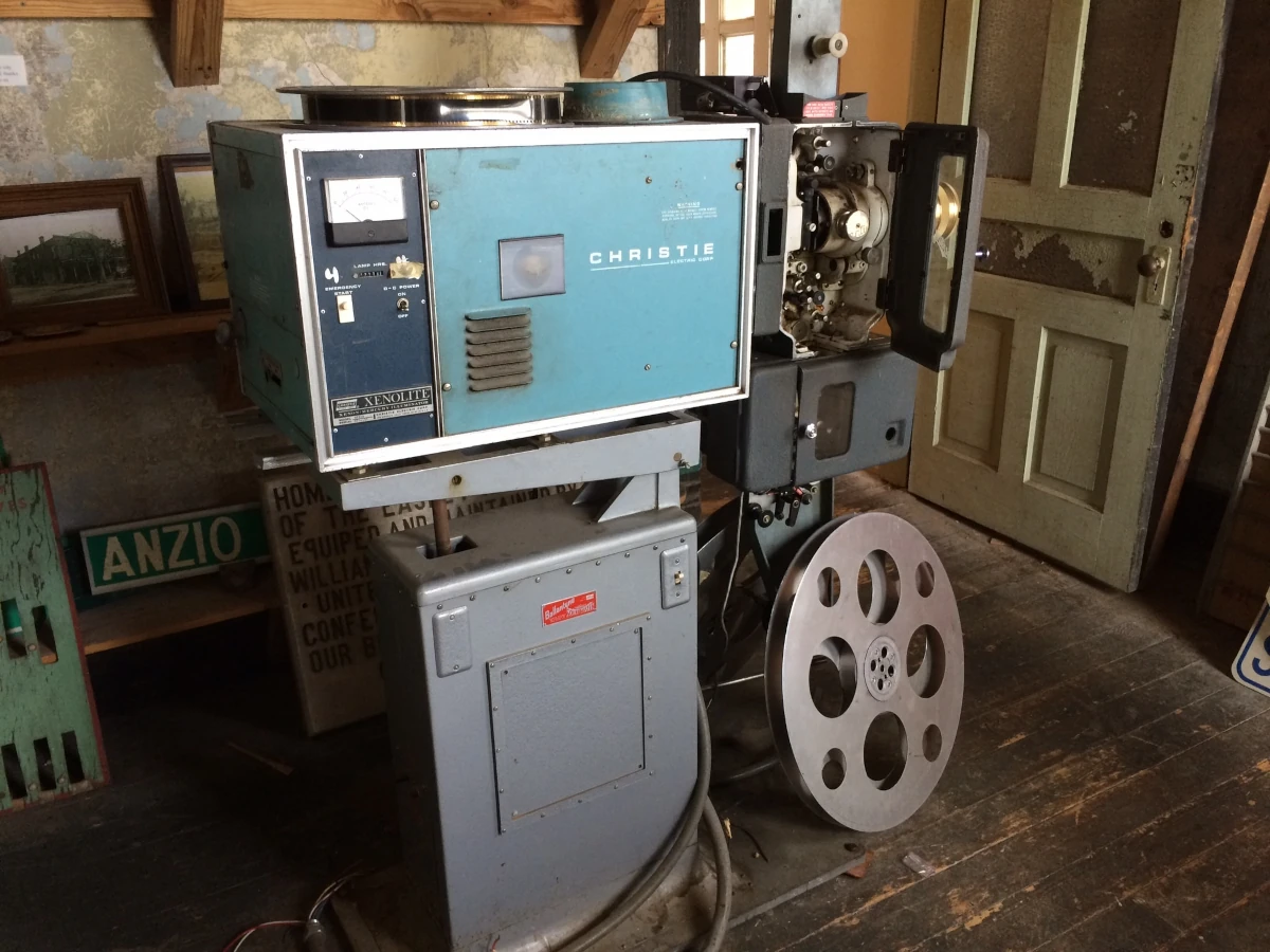 An old blue movie projector.